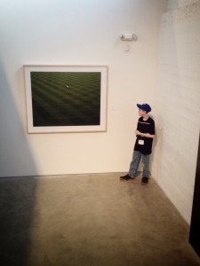 Photo of a Photo. One of CAM's army of young docents waiting to pass on the gospel of Alec Soth. Photo by Alex Boerner