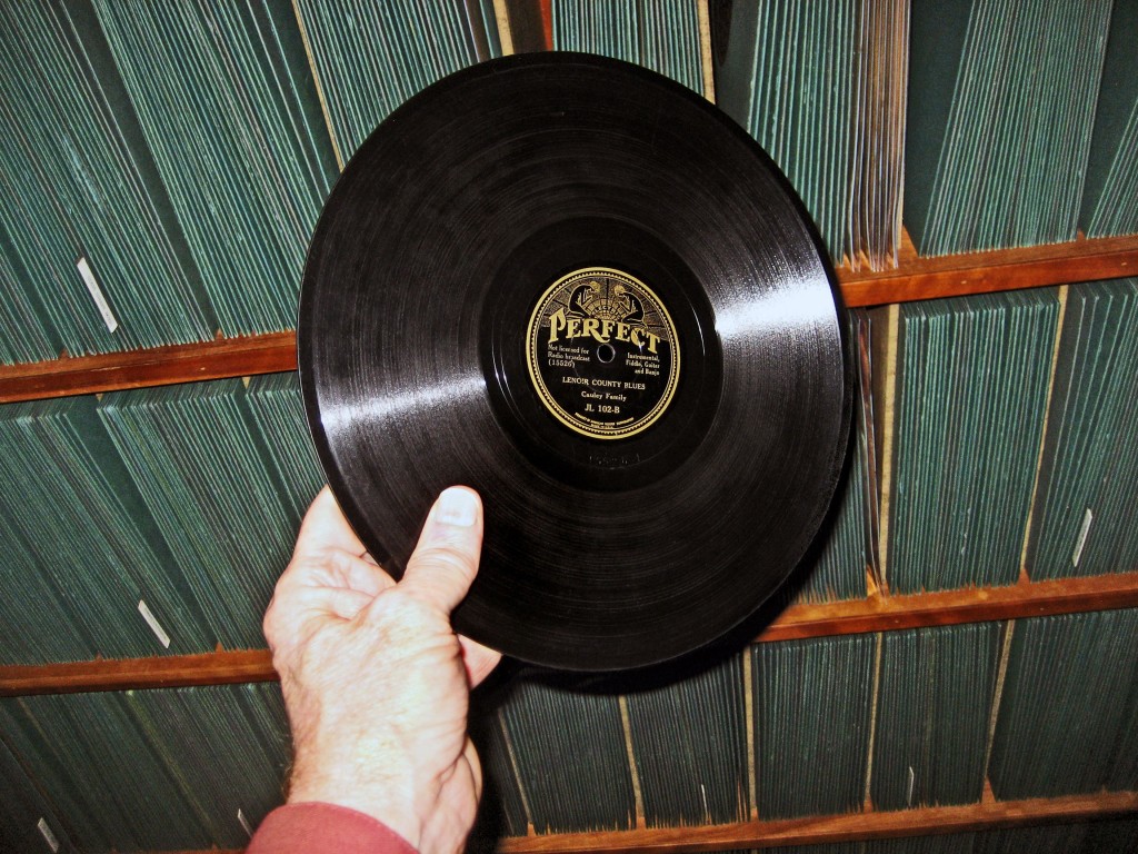 Marshall Wyatt holding the 78 "Lenoir County Blues" recorded by The Cauley Family in 1934.  This is the only known copy of this recording to exist today.